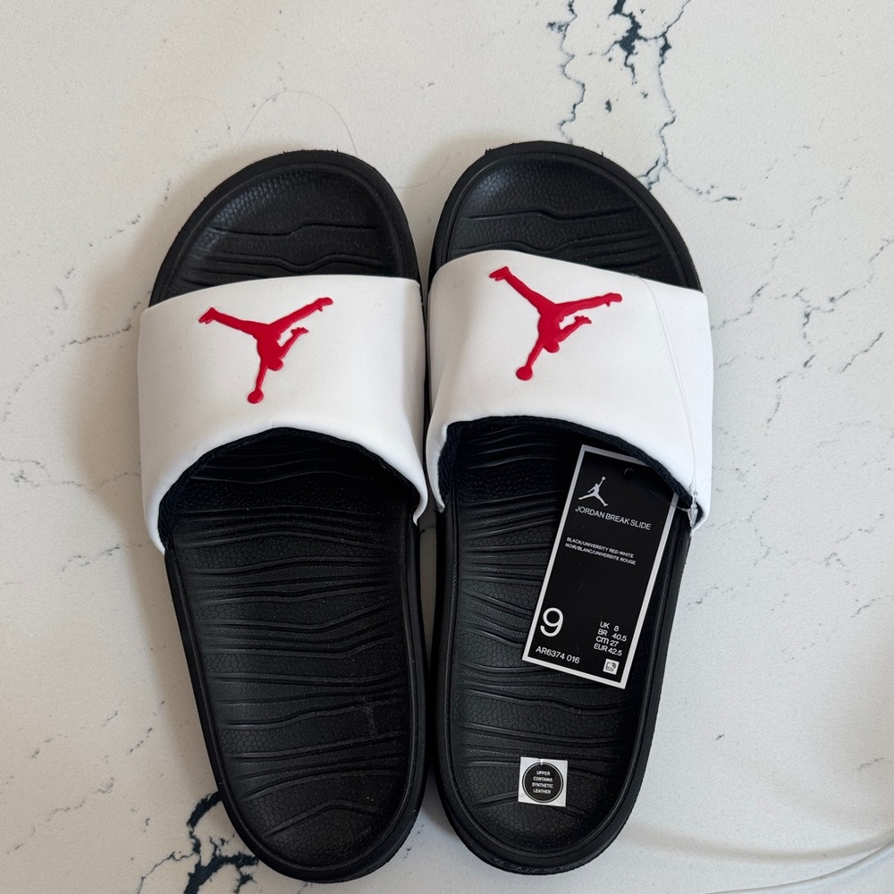 Nike Black and White Slide Sandals with Red Logo